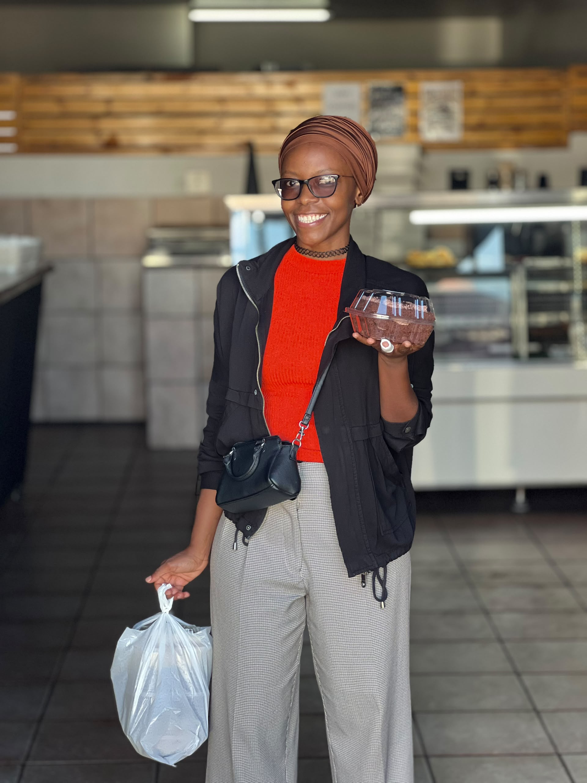 Tangeni Haufiku, happy Carens Bakery Corner CC customer