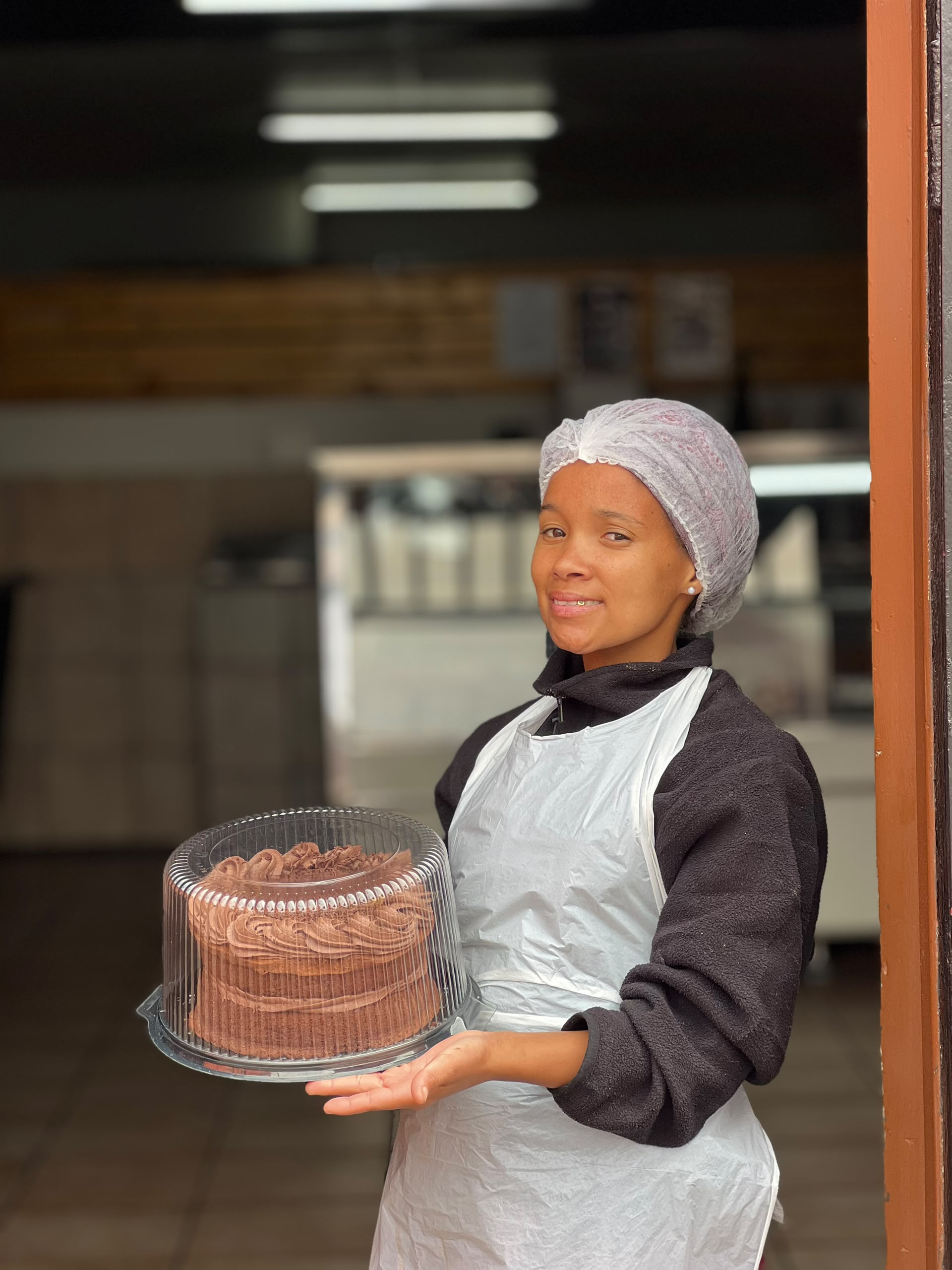 Carens Bakery Corner CC baker 6 preparing fresh bakes in the Walvis Bay kitchen