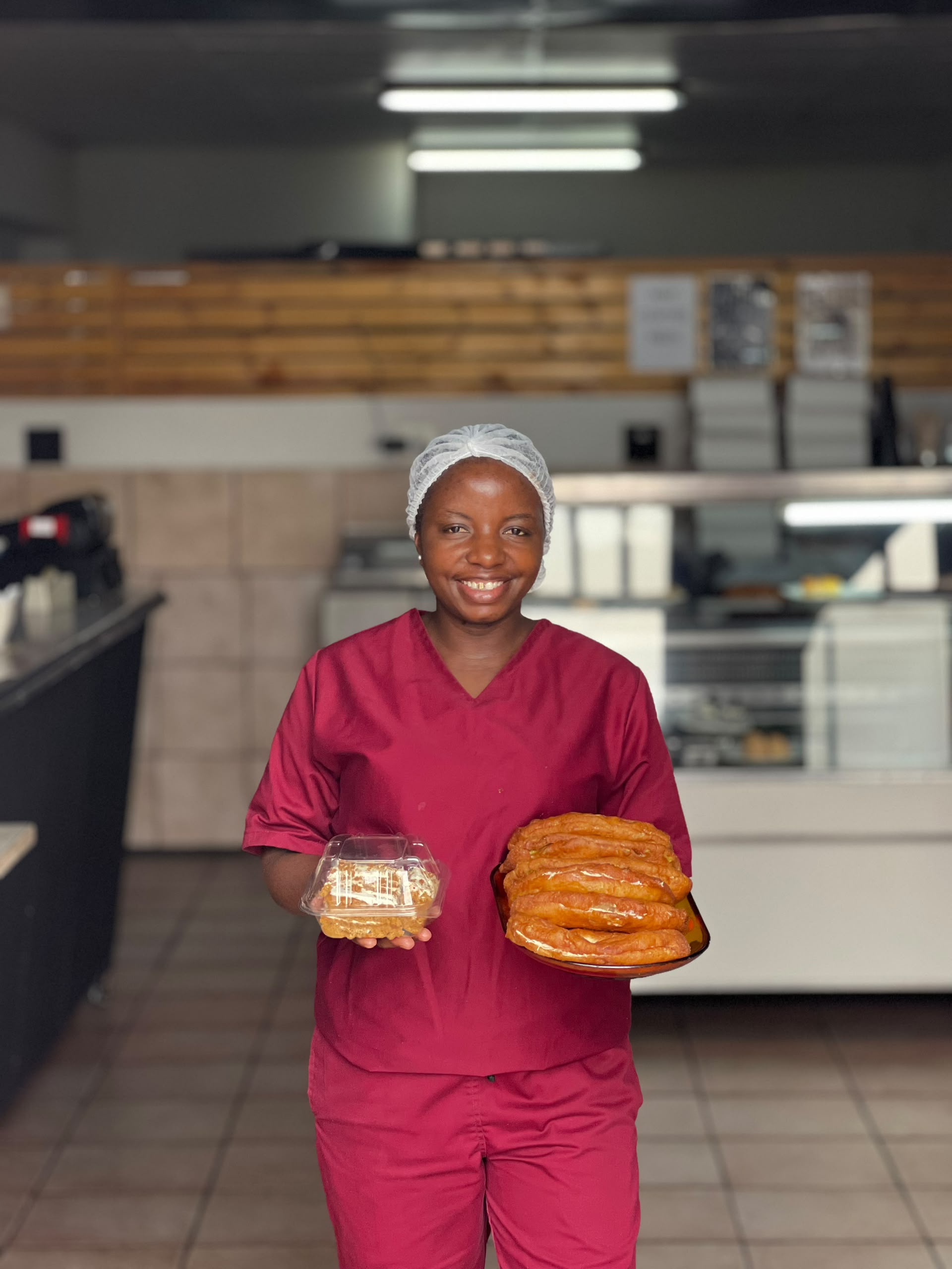 Carens Bakery Corner CC baker 5 preparing fresh bakes in the Walvis Bay kitchen